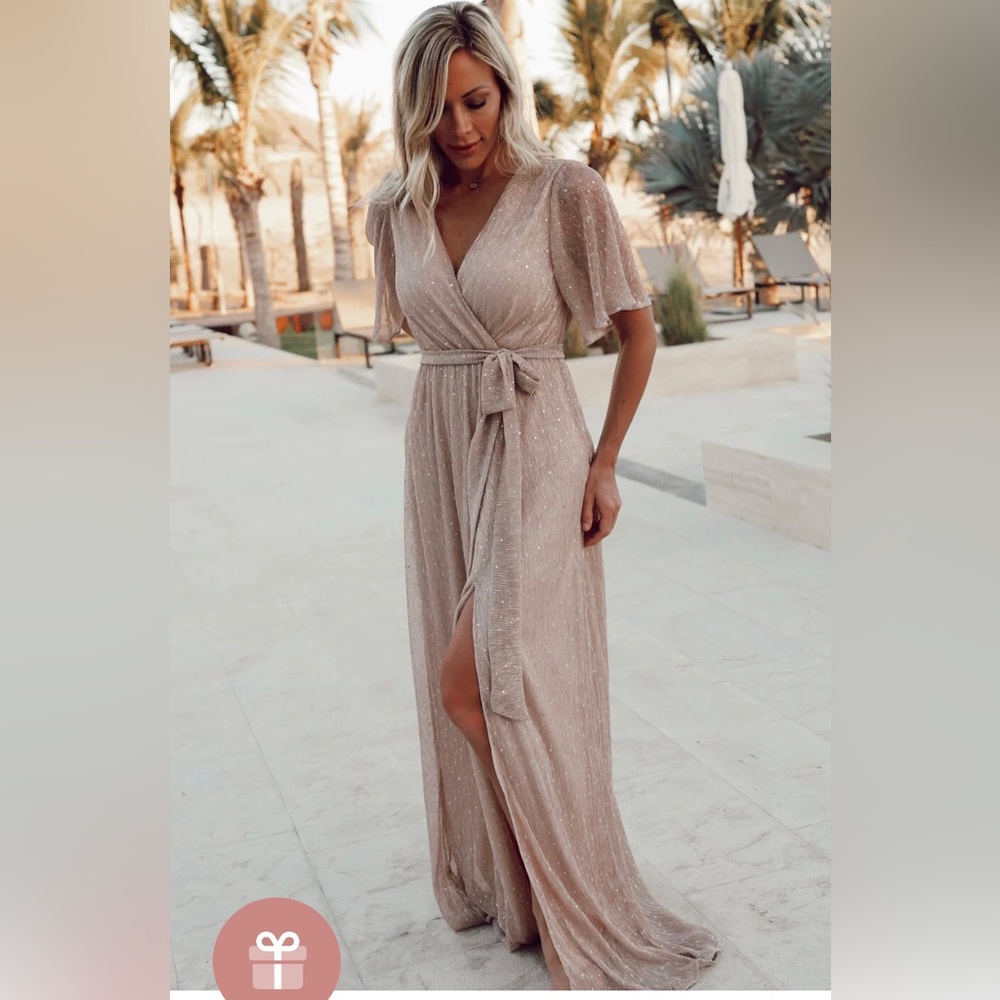 Grace Sparkle gown from Baltic Born. Worn once for a wedding, size large.